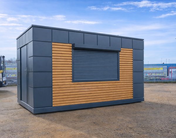 Portable kiosk unit with dark grey panels, horizontal timber slats, and roller shutter serving window